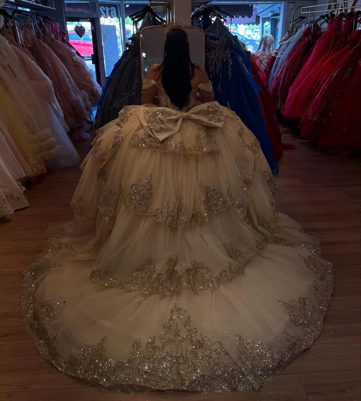 Off Shoulder Sleeveless Champagne Sweet 15 Quinceañera Dress with Beaded Appliques Ruffles Tiered Bow Knot