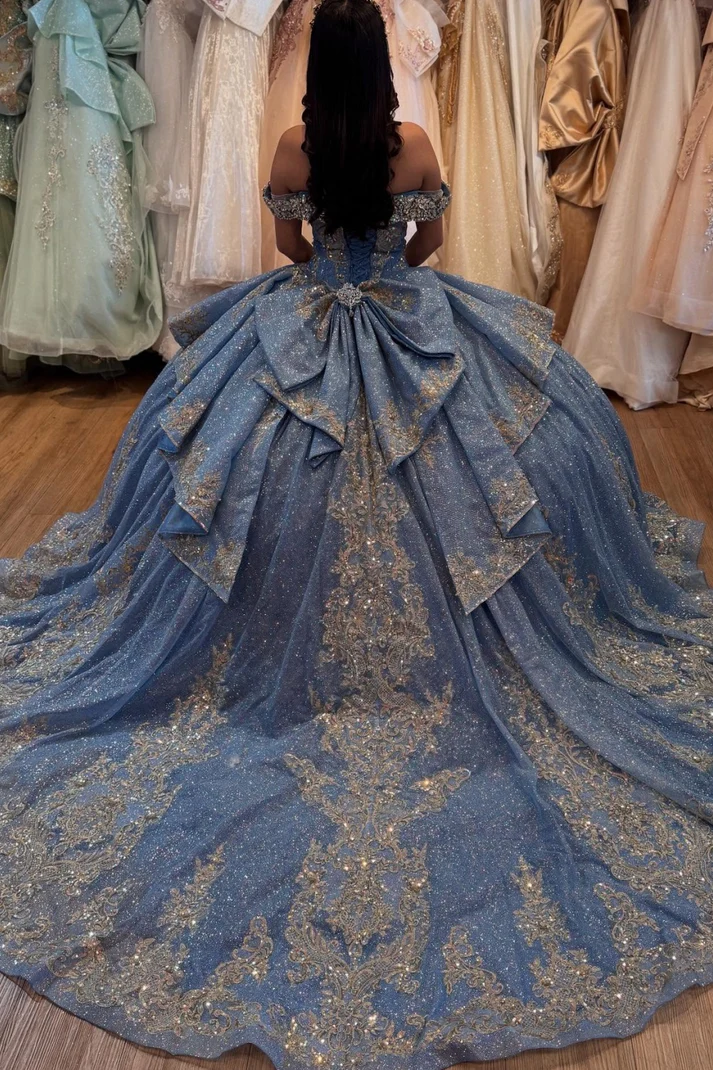 Off Shoulder Sleeveless Crystal Sequins Silver Appliques Ruffles Bow Knot Blue Quinceañera Dress for Sweet 15