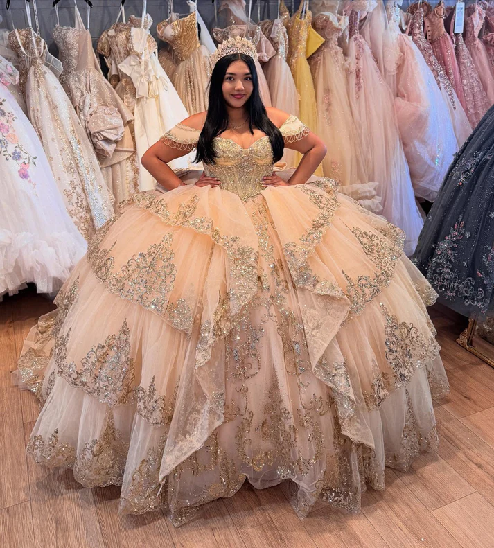 Off Shoulder Sleeveless Champagne Sweet 15 Quinceañera Dress with Beaded Appliques Ruffles Tiered Bow Knot