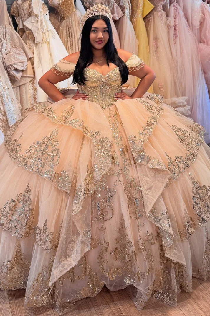 Off Shoulder Sleeveless Champagne Sweet 15 Quinceañera Dress with Beaded Appliques Ruffles Tiered Bow Knot